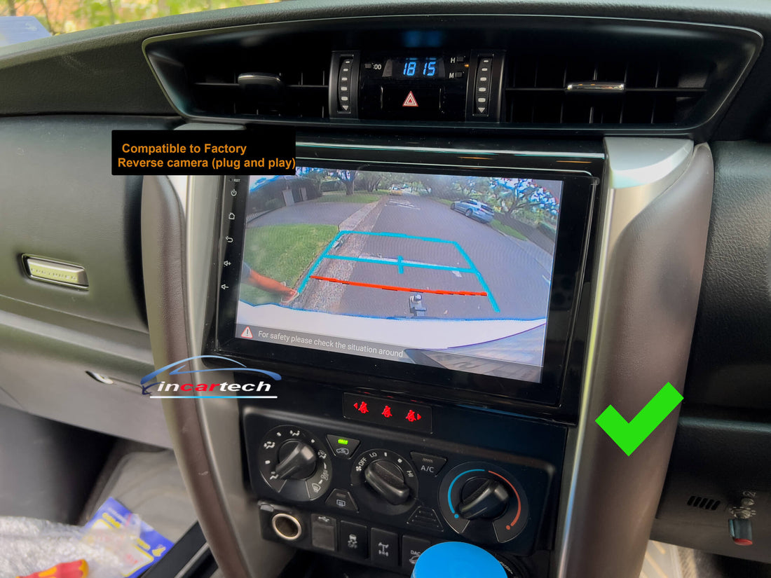 An aftermarket GPS wireless stereo system with a touchscreen interface installed in a vehicle, displaying Apple Carplay and Android Auto app icons.