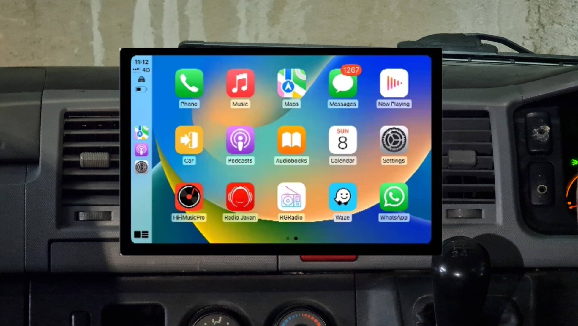 A 13.3-inch GPS Bluetooth wireless stereo radio interface displayed inside a vehicle's dashboard, compatible with Apple Carplay and Android Auto.