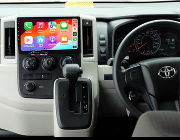 An aftermarket GPS wireless stereo radio with Apple Carplay and Android Auto interface installed in a vehicle's dashboard.