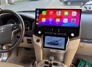 An image showing the after-market touchscreen stereo system installed in a vehicle, displaying a colorful interface with icons for Apple CarPlay and Android Auto features.