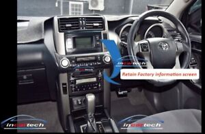 A black dashboard mount for a Toyota Prado 150 series car audio system, labeled with 'Proline Car Audio & Accessories'.