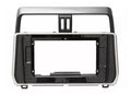A Toyota Prado 2017-2025 150 Series stereo facia suitable for both 10 inch android and 7 inch Double din, made of black ABS plastic with mounting brackets.