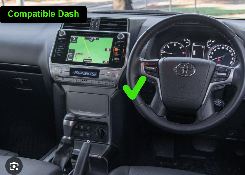 A Toyota Prado 2017-2025 150 Series stereo facia suitable for both 10 inch android and 7 inch Double din, made of black ABS plastic with mounting brackets.